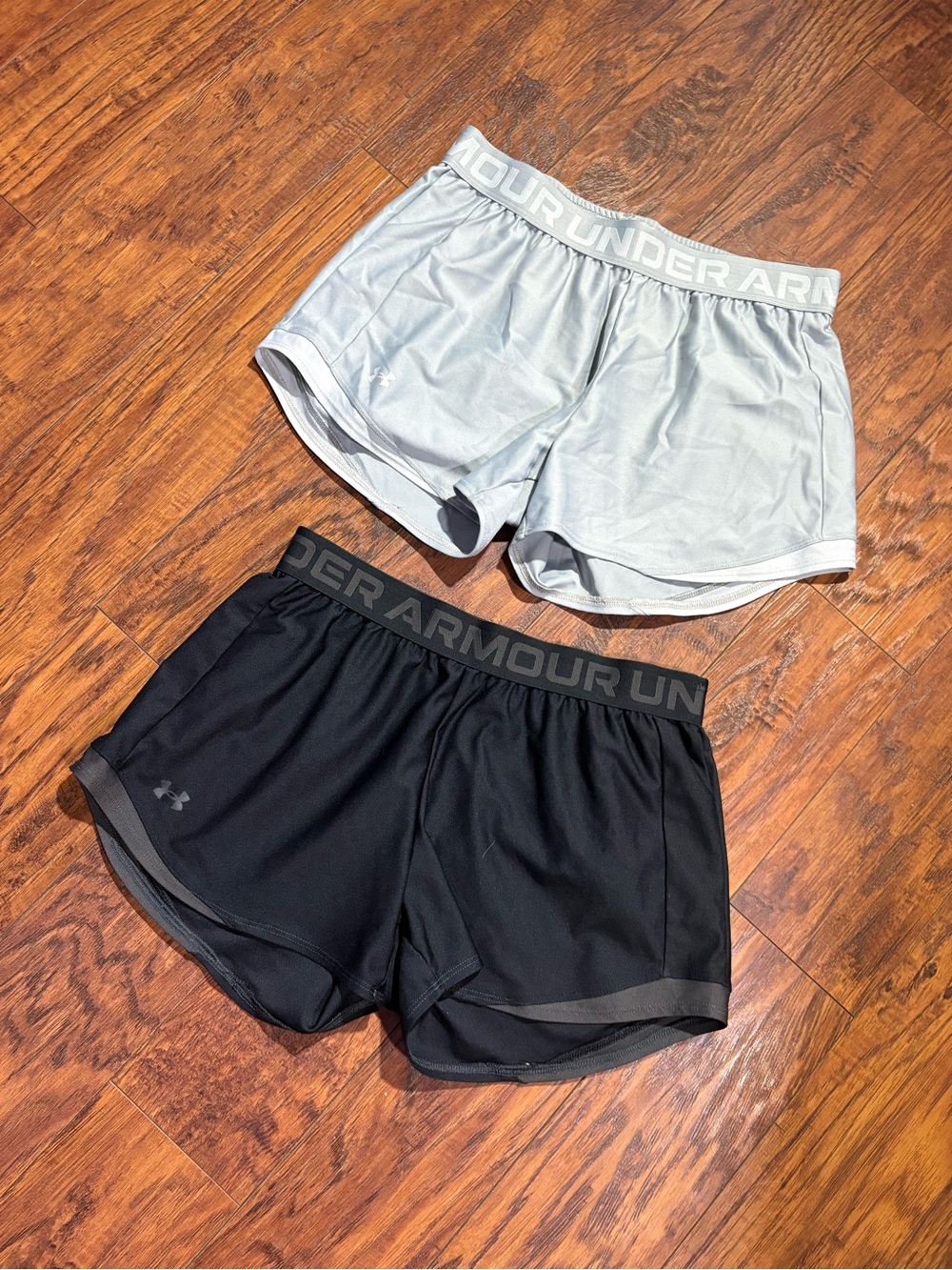 2 pairs of Under Armour women’s size S pull on athletic shorts